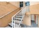 Exterior stairwell leading up to the units on the second floor, with access to unit 141 at 5000 Red Rock St # 241, Las Vegas, NV 89118