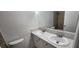 Bathroom with a double sink vanity and toilet at 510 Holick Ave, Henderson, NV 89011