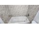 Bathtub and shower with tiled walls at 510 Holick Ave, Henderson, NV 89011