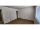 Inviting bedroom with tiled floor, light walls, and a window at 510 Holick Ave, Henderson, NV 89011
