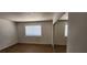 Cozy bedroom with mirrored closet and tile flooring at 510 Holick Ave, Henderson, NV 89011