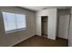 This bedroom offers a window and a closet with sliding doors at 510 Holick Ave, Henderson, NV 89011