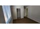 The bedroom features a window, closet, and tiled floors at 510 Holick Ave, Henderson, NV 89011