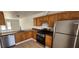 Modern kitchen with stainless steel appliances at 510 Holick Ave, Henderson, NV 89011