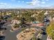 Aerial view of the neighborhood featuring lush greenery, community pool, and surrounding residences at 5211 Caspian Springs Dr # 201, Las Vegas, NV 89120