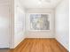 Bright bedroom with neutral walls, wood flooring and large window with bright, natural light at 5211 Caspian Springs Dr # 201, Las Vegas, NV 89120
