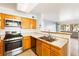 Well-appointed kitchen with essential appliances, ample counter space, and a convenient layout for cooking and meal prep at 5211 Caspian Springs Dr # 201, Las Vegas, NV 89120