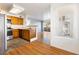 Efficient kitchen featuring bright cabinetry, countertops and modern appliances, seamlessly connected to the living area at 5211 Caspian Springs Dr # 201, Las Vegas, NV 89120