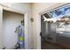 Enclosed outdoor water heater next to a sliding glass door adds functionality and maximizes space at 5211 Caspian Springs Dr # 201, Las Vegas, NV 89120