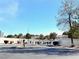 Gated entrance to Canyon Willow community with lush landscaping and mature trees at 5222 Mandalay Springs Dr # 202, Las Vegas, NV 89120