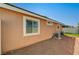 Home exterior featuring a window and manicured gravel at 5292 Cholla Cactus Ave, Las Vegas, NV 89141
