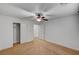 Bedroom features neutral carpet, ceiling fan, and white trim at 5292 Cholla Cactus Ave, Las Vegas, NV 89141
