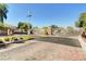 Secured gate entrance to the residential community featuring brick-paved streets, landscaping, and a secure entrance at 5292 Cholla Cactus Ave, Las Vegas, NV 89141