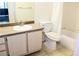 A bathroom featuring a vanity, toilet, and a shower/tub combo with a shower curtain at 555 E Silverado Ranch Blvd # 2005, Las Vegas, NV 89183