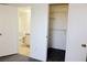 Bedroom view featuring an open closet and bathroom with tiled floors at 555 E Silverado Ranch Blvd # 2005, Las Vegas, NV 89183