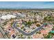 Exceptional aerial view showcases home layout, neighborhood, pools, and landscaping at 6 Desert Dawn Ln, Henderson, NV 89074
