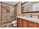 Modern bathroom featuring a sleek vanity, frameless glass shower, and neutral color palette at 6 Desert Dawn Ln, Henderson, NV 89074
