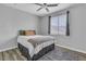 Bedroom featuring a comfortable queen-sized bed, ceiling fan, and carpeted floors at 6 Desert Dawn Ln, Henderson, NV 89074