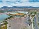 Picturesque community with a lake, desert landscape, basketball courts and scenic mountain views at 6 Desert Dawn Ln, Henderson, NV 89074