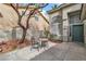 Charming courtyard with a table and chairs, offering a relaxing outdoor space at 6 Desert Dawn Ln, Henderson, NV 89074