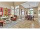 Inviting dining area with tray ceiling, lots of natural light, and stylish decor at 6 Desert Dawn Ln, Henderson, NV 89074