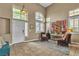 Elegant entryway featuring high ceilings, tile flooring, and a decorative wine rack at 6 Desert Dawn Ln, Henderson, NV 89074