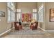 Bright living area with ample natural light and comfortable seating at 6 Desert Dawn Ln, Henderson, NV 89074