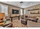 Beautiful living room with tile floors, recessed lighting, and stylish decor at 6 Desert Dawn Ln, Henderson, NV 89074