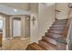 Beautiful staircase showcasing hardwood steps and decorative details leading to the upper level of the home at 6 Desert Dawn Ln, Henderson, NV 89074