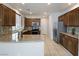 Spacious kitchen featuring granite countertops, stainless steel appliances, and tile flooring at 6237 Glimmering Light Ave, Las Vegas, NV 89139