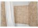 Bathroom with a tub and a shower curtain, offering a practical and functional space at 6320 Vicuna Dr, Las Vegas, NV 89146