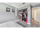 Well-lit bedroom with closet and adjoining bathroom at 6320 Vicuna Dr, Las Vegas, NV 89146