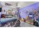 Cozy bedroom featuring stylish decor and a comfortable bed with plenty of natural light at 6320 Vicuna Dr, Las Vegas, NV 89146