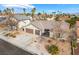 Charming single-story home featuring a two-car garage and low maintenance desert landscaping at 6320 Vicuna Dr, Las Vegas, NV 89146