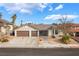 Charming single-story home with a three-car garage at 6320 Vicuna Dr, Las Vegas, NV 89146
