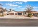 Charming single-story home with a two-car garage and well-maintained landscaping at 6320 Vicuna Dr, Las Vegas, NV 89146