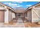 This single-story home features a secure gated entry and well-maintained desert landscaping in a tranquil residential neighborhood at 6320 Vicuna Dr, Las Vegas, NV 89146