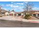 Charming single-story home features a two-car garage, mature landscaping, and a well-maintained front yard at 6320 Vicuna Dr, Las Vegas, NV 89146
