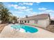 Inviting pool with ladder and a well-maintained yard at 6320 Vicuna Dr, Las Vegas, NV 89146