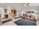Spacious living area features an open-concept design that flows seamlessly into the kitchen and dining area at 672 Lampshire Ln, Pahrump, NV 89060