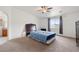 Main bedroom with carpet, ceiling fan, and natural light at 672 Lampshire Ln, Pahrump, NV 89060