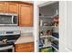 View of the pantry featuring shelving with food and household essentials at 672 Lampshire Ln, Pahrump, NV 89060