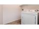 Laundry room with a dryer and tile flooring at 7936 Dexter Falls St, Las Vegas, NV 89149