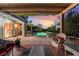 Relaxing outdoor patio area with a swimming pool and comfortable seating at 872 Timber Walk Dr, Henderson, NV 89052