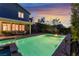Beautiful backyard features a swimming pool, lounge area, and mature landscaping at 872 Timber Walk Dr, Henderson, NV 89052
