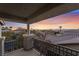 Home's balcony with iron railing offers beautiful sunset views of neighborhood at 872 Timber Walk Dr, Henderson, NV 89052