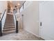 Inviting entryway with staircase leading to the upper level of the house at 872 Timber Walk Dr, Henderson, NV 89052