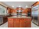 Well-equipped kitchen with stainless steel appliances and granite countertops at 872 Timber Walk Dr, Henderson, NV 89052
