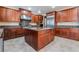 Spacious kitchen with granite countertops, stainless steel appliances, and center island at 872 Timber Walk Dr, Henderson, NV 89052