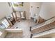 Open-concept living room with fireplace and high ceilings at 872 Timber Walk Dr, Henderson, NV 89052